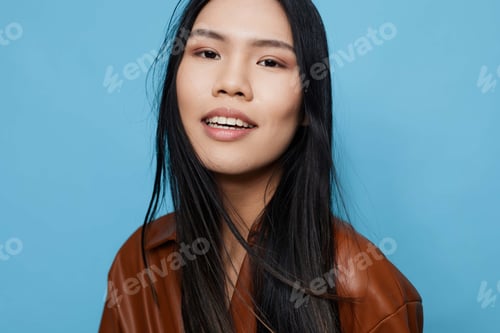 Preview: Woman smile girl trendy asian studio portrait lifestyle happy blue attractive background