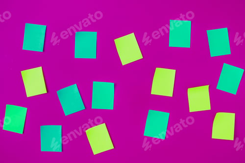 Preview: top view of some color paper stickers on the wall background, abstract ideas