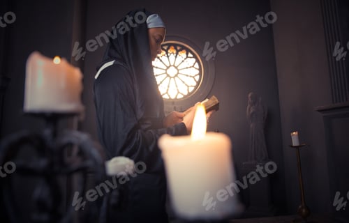 Preview: Nun praying in a monastery