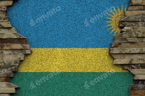 Preview: Rwanda flag depicted in paint colors on old stone wall close up
