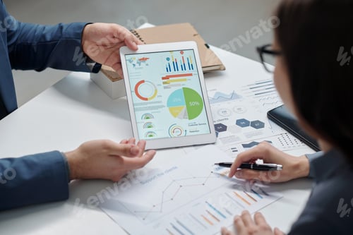 Preview: Two Colleagues Discussing Data Statistics