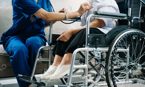 Preview: Nurse assisting a patient in a wheelchair, showcasing care, compassion, and professionalism