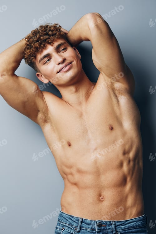 Preview: man beauty bicep lifestyle male jeans torso handsome care body curly smile
