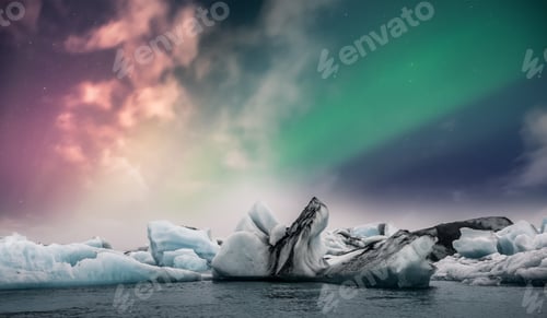 Preview: Northern lights aurora borealis over Jokulsarlon glacier ice lagoon in Iceland