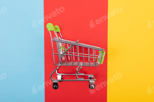 Preview: self-service supermarket trolley cart with green handle on colorful background