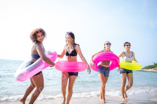 Preview: Group of happy friends having fun at ocean beach,Summer vacation.