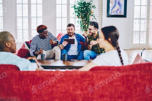 Preview: Young women talking during home friendly meeting in modern apartment