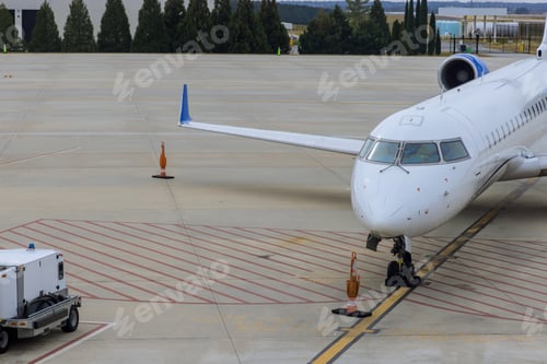 Preview: Front view of landed airplane in a terminal of at the John F. Kennedy International Airport