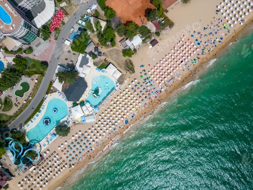Preview: aerial view of Bulgaria's Golden Sands resort during the summer season: an array of hotels, pools