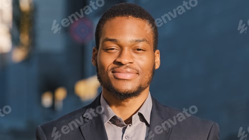 Preview: Happy African American businessman male boss employee manager ethnic entrepreneur man guy looking at