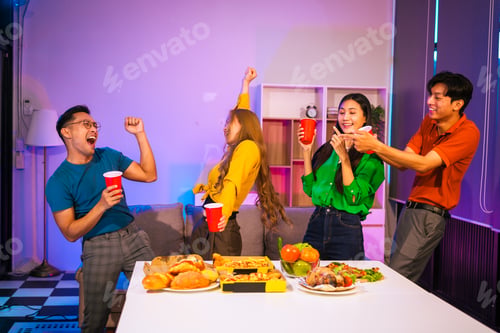 Preview: Four Asian friends, two men two women,celebrate in an office party.They enjoy a fun-filled night