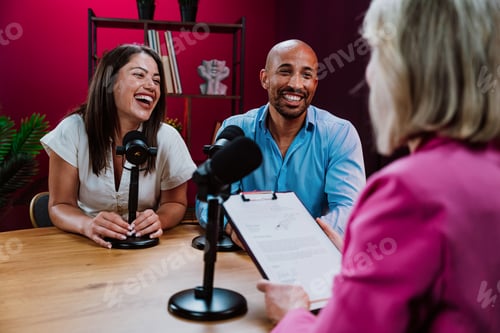 Preview: Content creators recording a podcast interview in studio