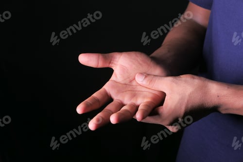 Preview: man suffering pain in hand close up
