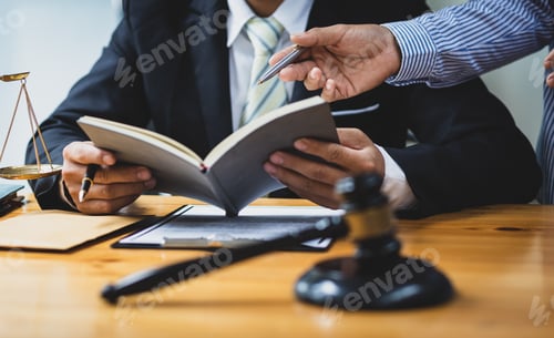 Preview: Legal justice concept. Lawyers work at desks in law firms.