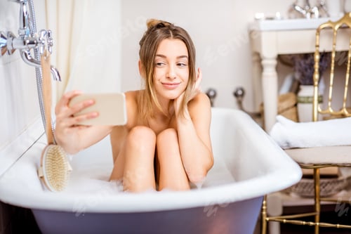 Preview: Woman bathing at the retro bathroom