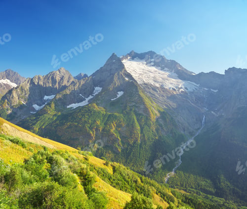 Preview: Nature landscape of Dombay Ulgen mountain glacier at cloudy day