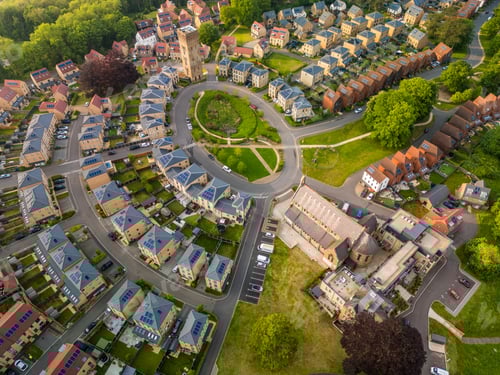 Preview: Aerial drone view of the Cane Hill area in Coulsdon, UK, with new houses and apartments.