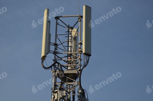 Preview: Closeup of a wireless communication antenna against a blue sky