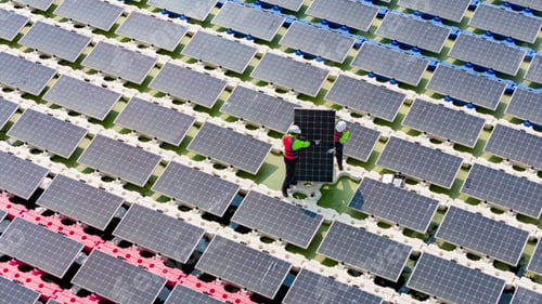 Preview: Renewable Energy Eco Technology Electric Power. Floating solar panels on lake.