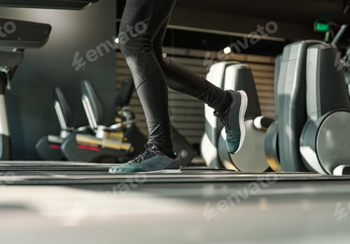 Preview: Mature people exercising in gym