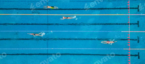Preview: group of swimmers training in an outdoor pool top view