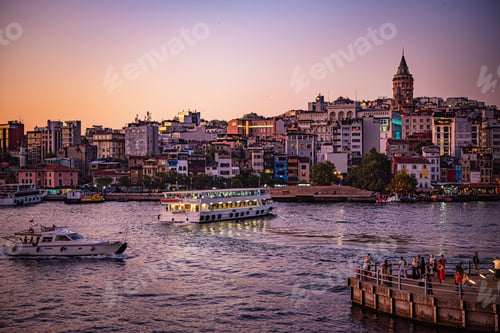 Preview: Istanbul, Turkey 18.08.2019. City sunset. View of the Galata tower across the Bosphorus Strait