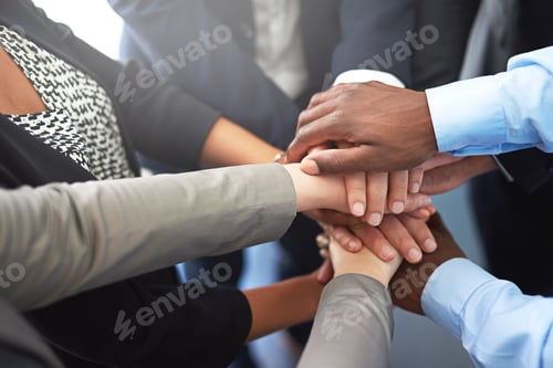 Preview: Success is a combined effort. Shot of businesspeople working in a modern office.