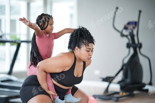 Preview: Plus size afro mom and daughter