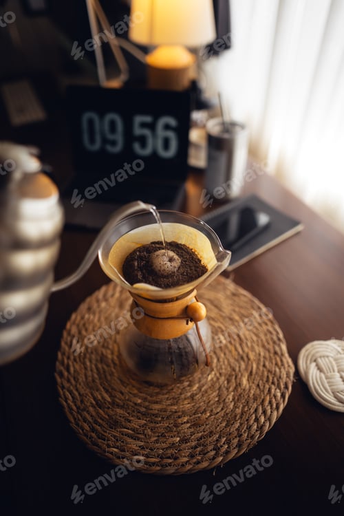 Preview: Drip coffee,Pouring water into filter coffee maker