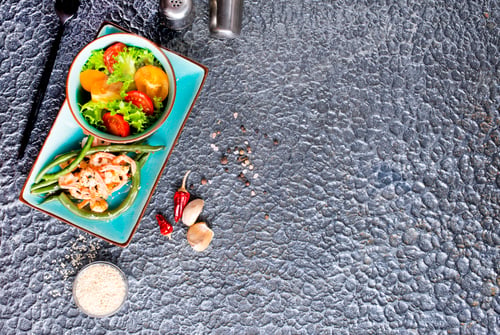 Preview: Healthy salad plate. Fresh seafood recipe. Grilled shrimps and fresh vegetable salad.