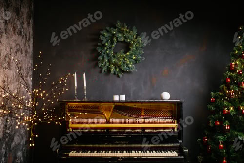 Preview: Piano keyboard with Christmas decoration, closeup