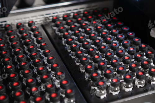 Preview: Autosampler picks up a vial and collects samples before injecting them for HPLC analysis.