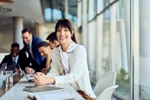 Preview: Professional Business Team Collaborating in a Modern Office Environment