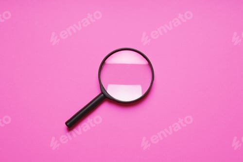 Preview: magnifying glass search symbol on pink background