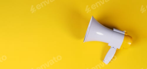 Preview: Megaphone is isolated on yellow background.