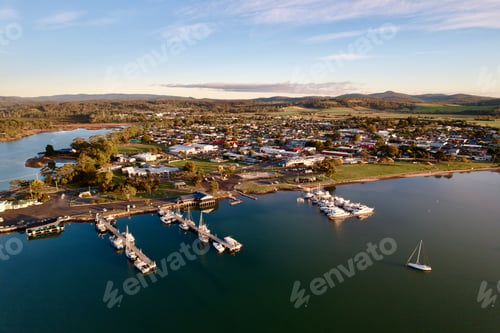 Preview: Aerial view of Saint Helens with moored boats along the shoreline. Tasmania, Australia