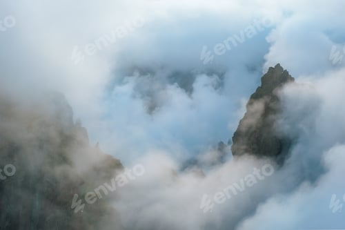 Preview: A mountain covered in fog and clouds. Madeira island, Portugal