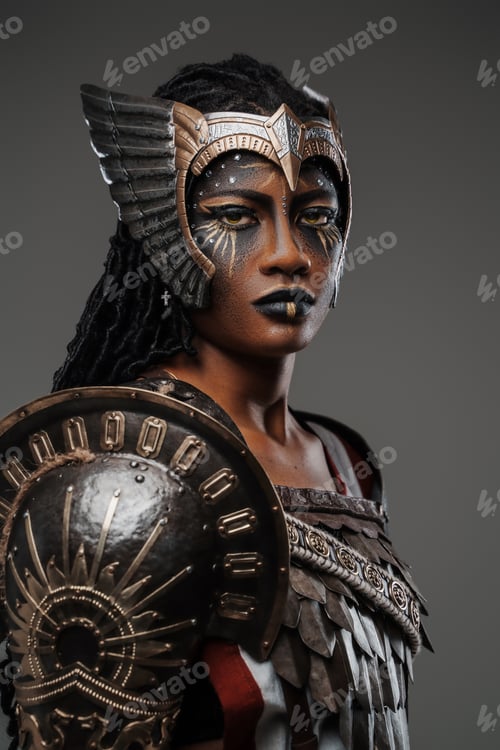 Preview: Ancient woman amazon dressed in steel armor looking at camera