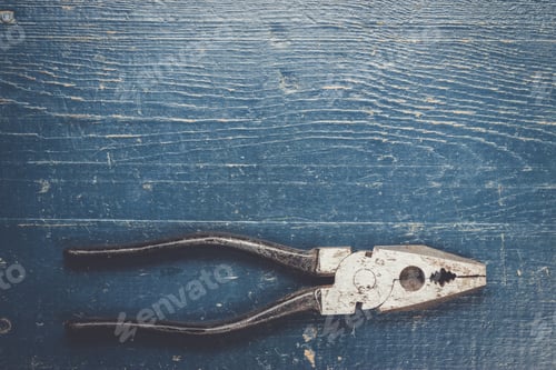 Preview: pliers on blue table