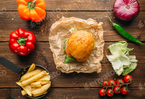 Preview: Juice burger with steak on wooden table closeup