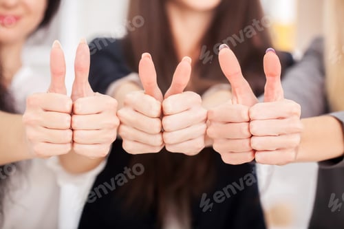 Preview: Team. Three business partners keeping thumbs up
