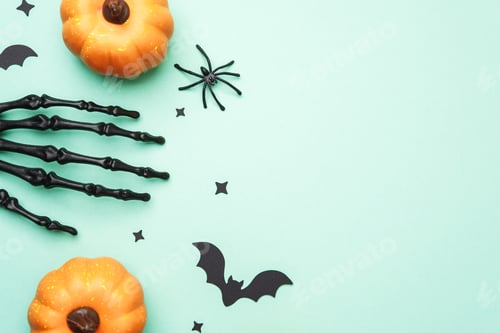 Preview: Halloween theme with pumpkins, skeleton hand, spider, bats, and stars on light blue background