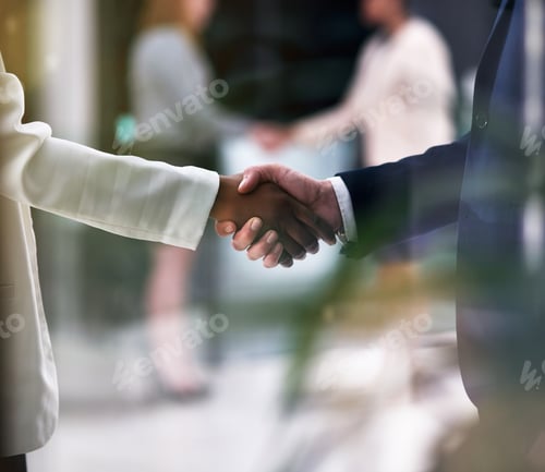 Preview: Introductions are in order. Shot of businesspeople shaking hands in an office.