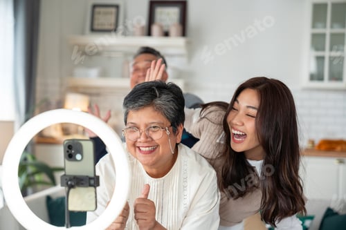 Preview: Asian middle-aged couple, with daughter, joyfully play dancing music dance trends Viral