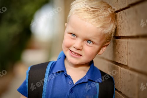 Preview: Portrait of a little boy in a pretty garden setting