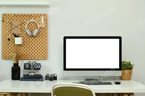 Preview: Front view blank computer monitor, camera, book and houseplant on white table