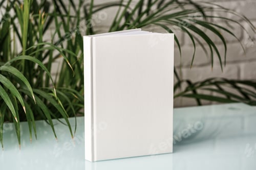 Preview: Tropical palm leaves and blank notepad mock up