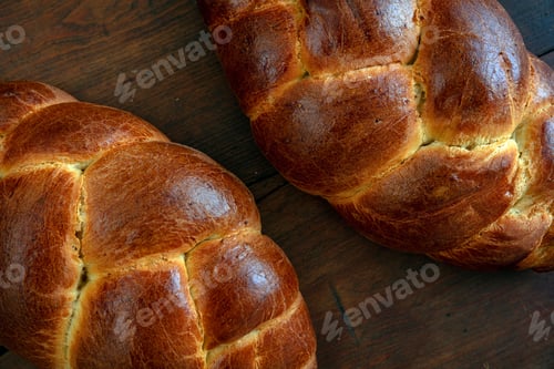 Preview: Easter tsoureki braid, greek easter sweet bread, on wooden background