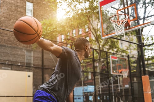 Preview: Basketball player training outdoors