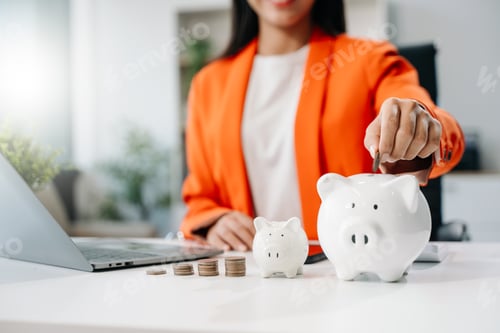 Preview: Woman putting coin into piggy bank, step up start up business to success, Saving money